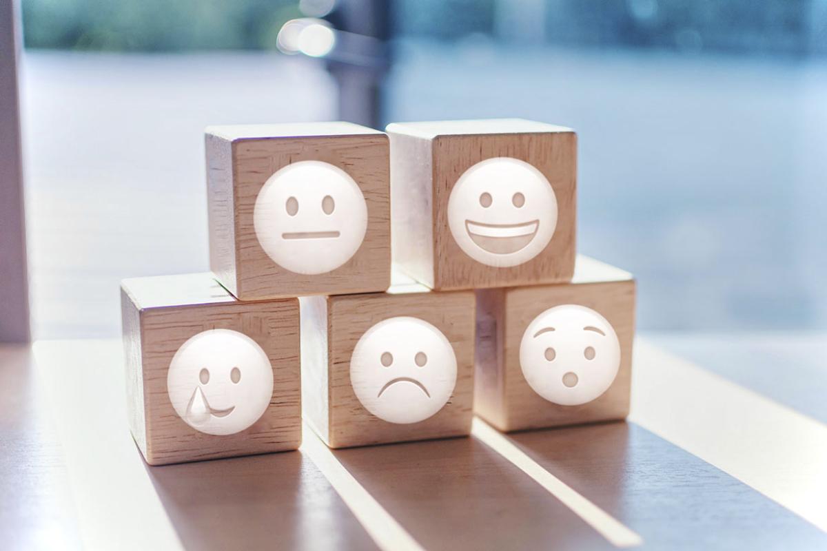 Variations of happy and sad symbols on blocks