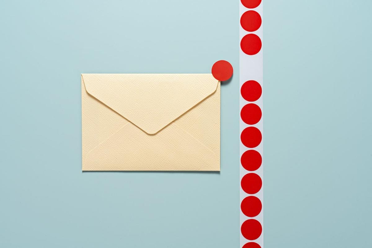 Envelope with red dots in a row