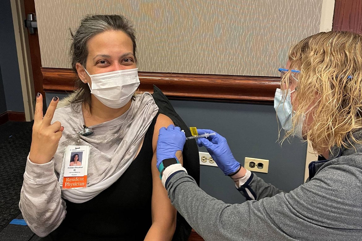 Christiana Shoushtari, MD, receiving COVID-19 vaccine