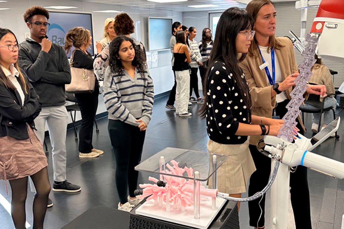 A high school student drives the Ion through artificial lungs in the TOME Truck