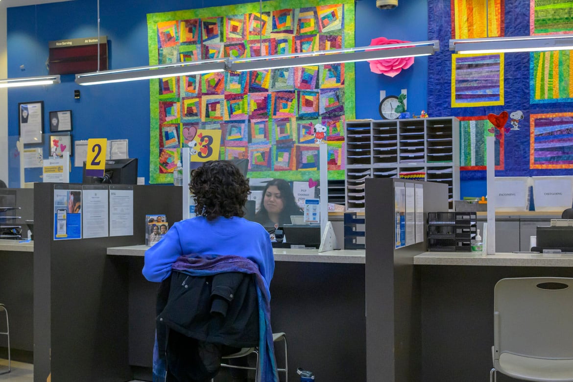 A patient checks in at Mary's Center