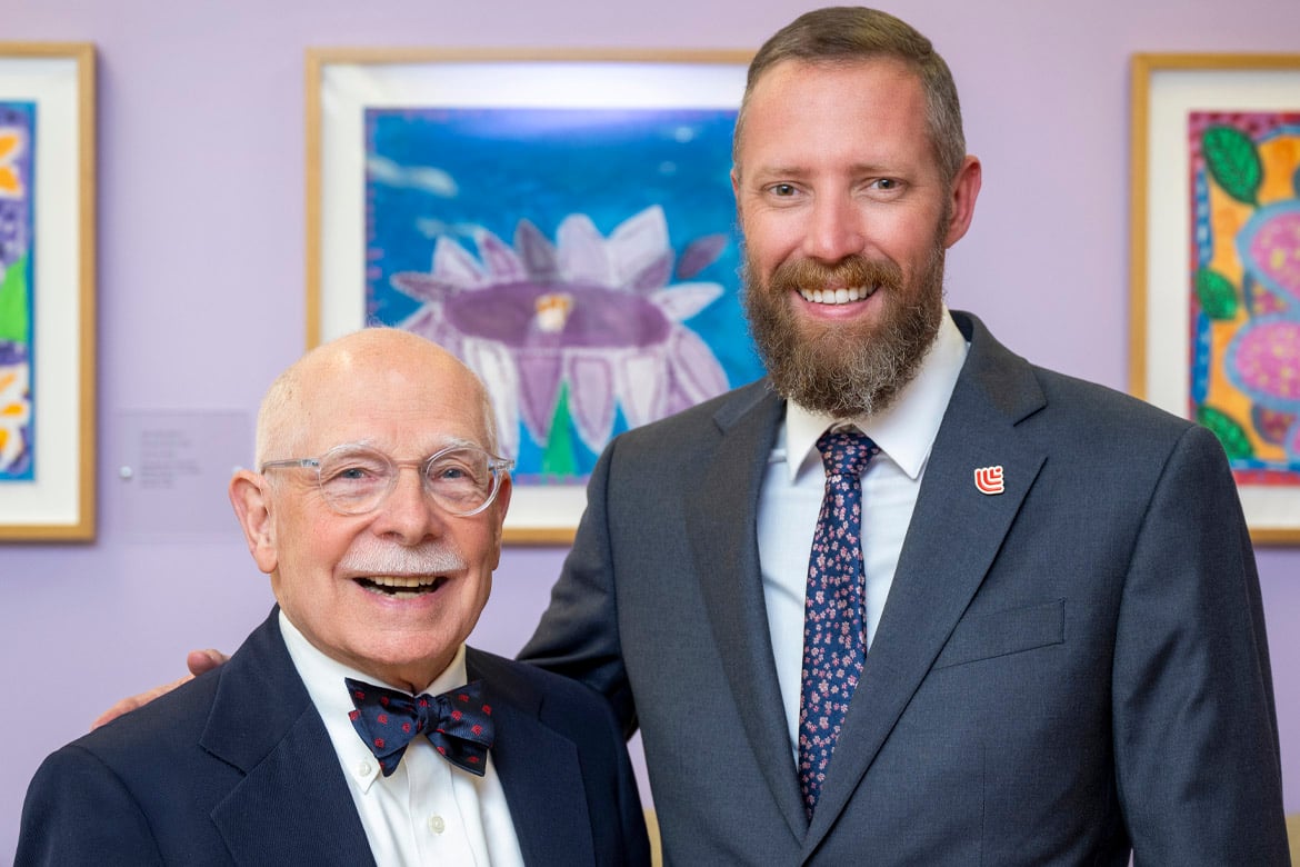 James Allison, MD, poses for a photo with Kyle Shelton, DO