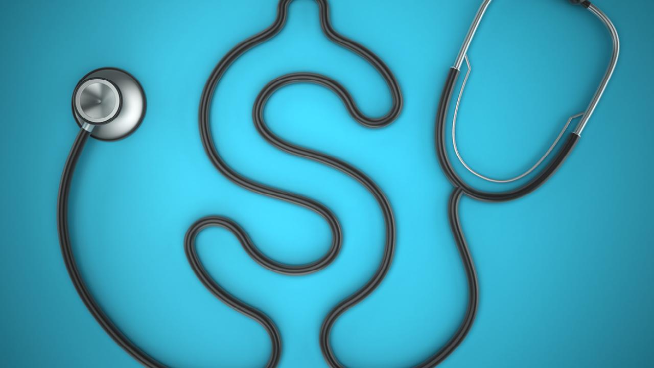 Stethoscope in the shape of a dollar sign