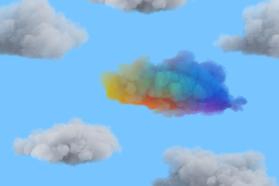 Colorful cloud surrounded by gray clouds