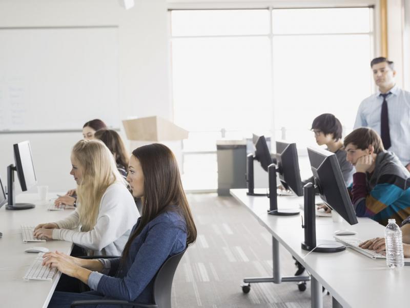 Students using computers in a classroom