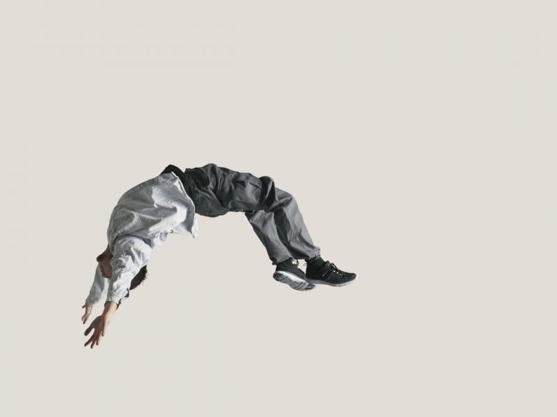 Man doing somersault in the air