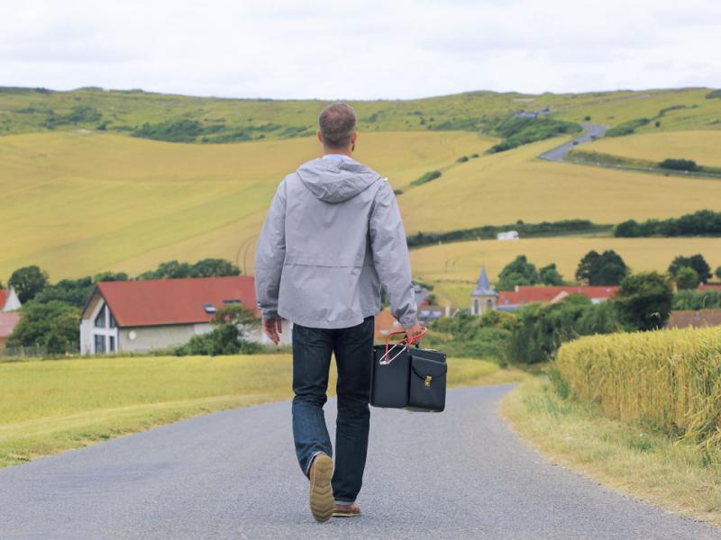 Person walking on a rural road