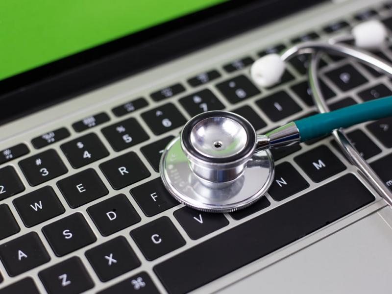 Stethoscope on laptop