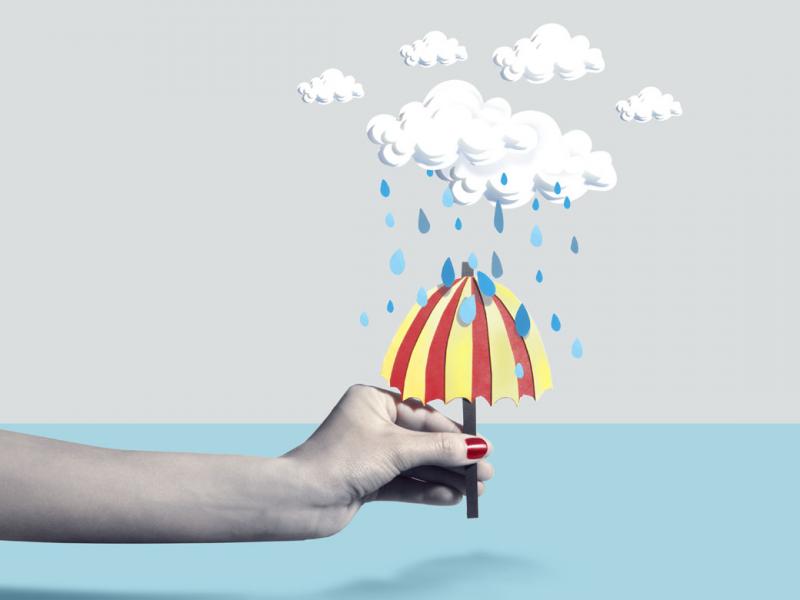 Woman holding 3D illustration of rain clouds and umbrella
