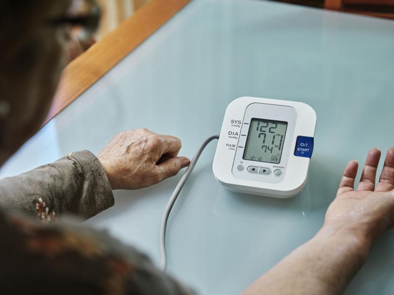 Person examining blood pressure