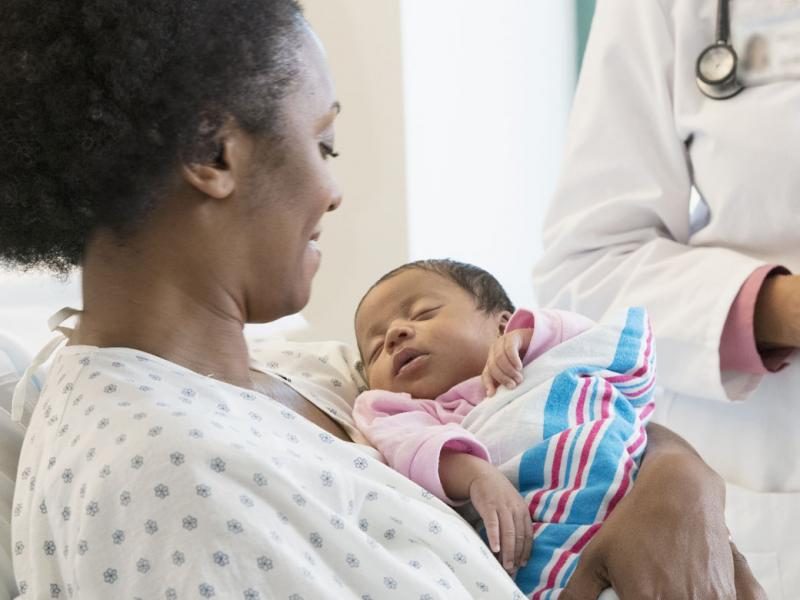 Woman holding an infant