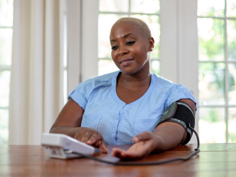 Person monitoring blood pressure