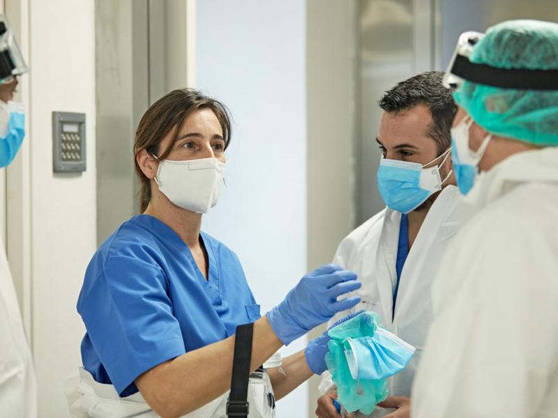 Health care workers in discussion