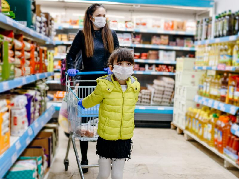 Child and parent in a grocery store