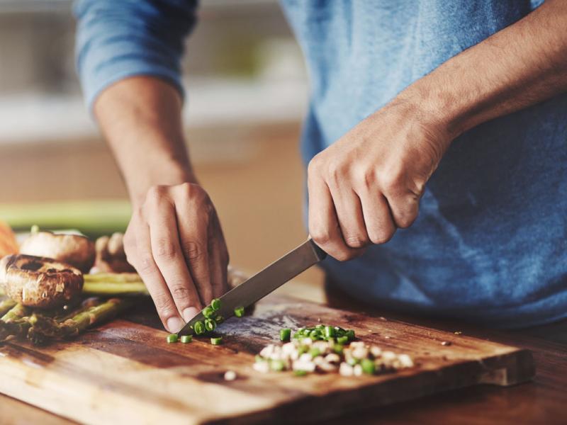 Person chopping vegetables