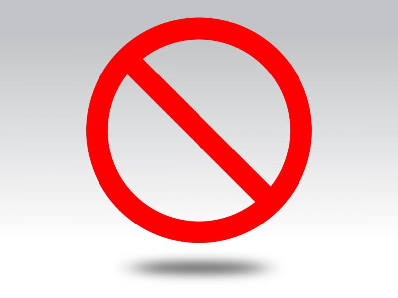 Illustration of red circle with a red line indicating “no” inside it