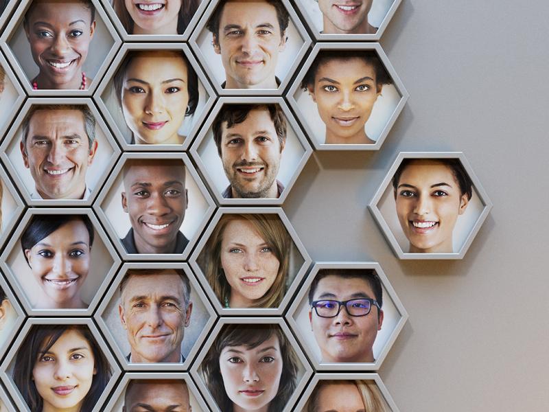 Hexagonal portraits of a diverse group of people linked together