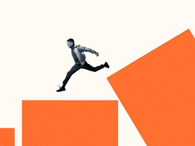 Figure leaping down a bar chart