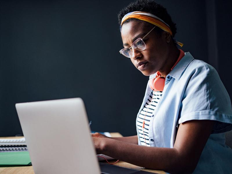 Person working at a laptop