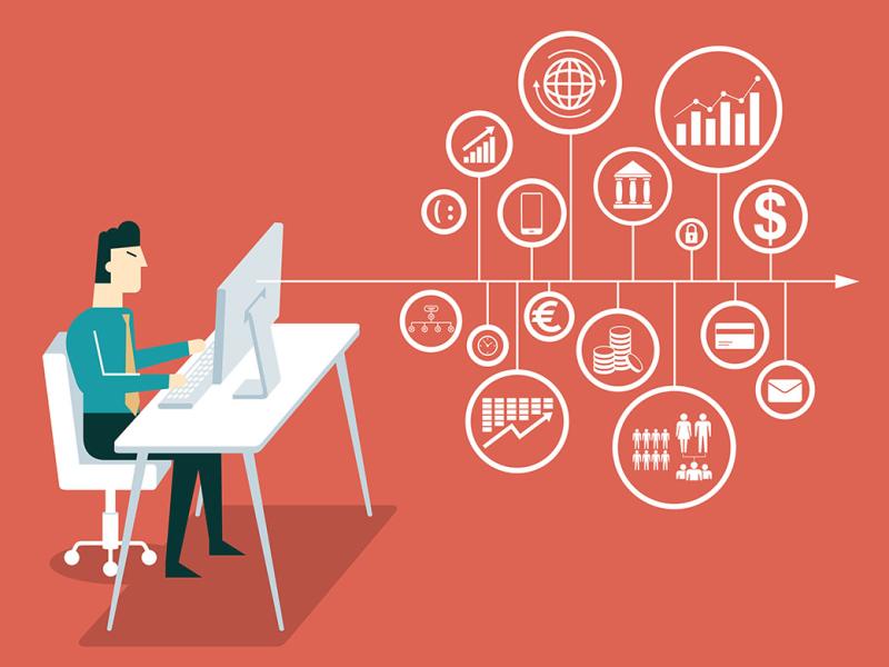 Person working at a desktop, surrounded by business icons