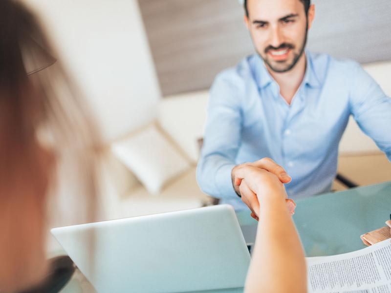 Two people shaking hands