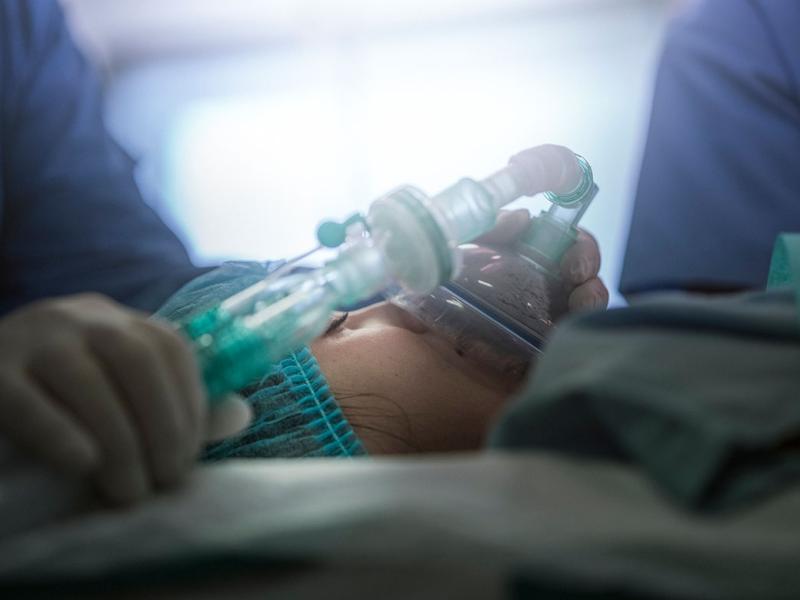 Young patient wearing oxygen mask