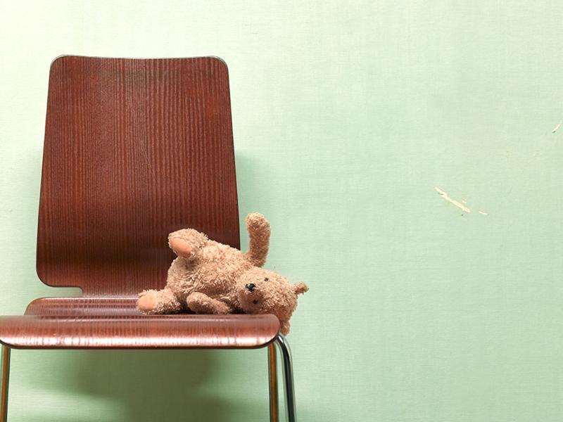  Teddy bear on an empty chair