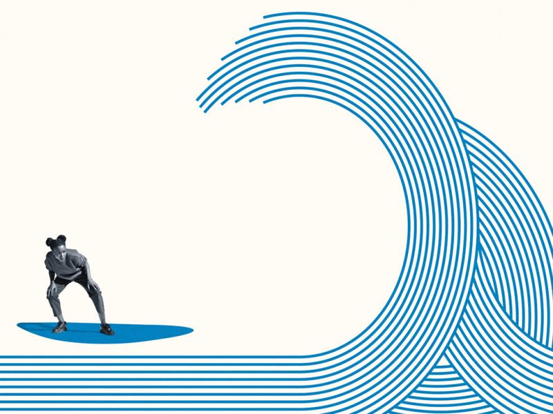 Young person surfing on a wave