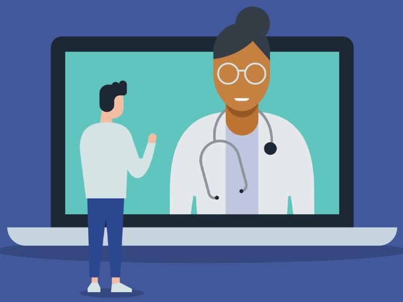 Telemedicine doctor visit with giant laptop computer