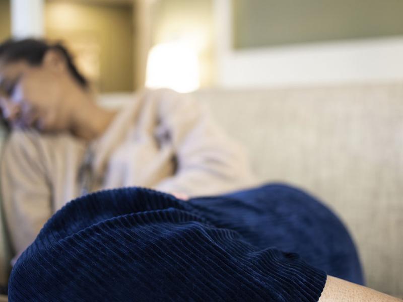 Sleeping person on a couch