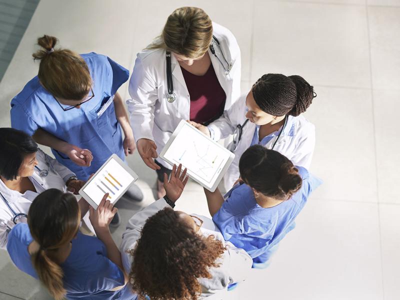 Overhead view of a group of health care workers in discussion