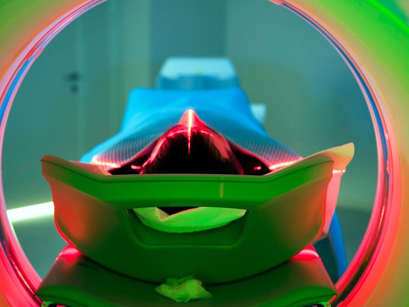 Patient laying on a CT scan platform