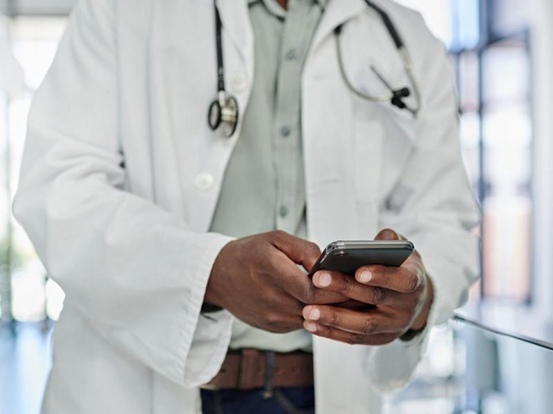 Physician using a smart phone