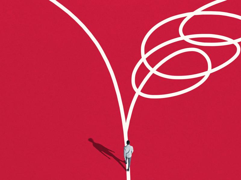 Figure walking toward two disparate paths