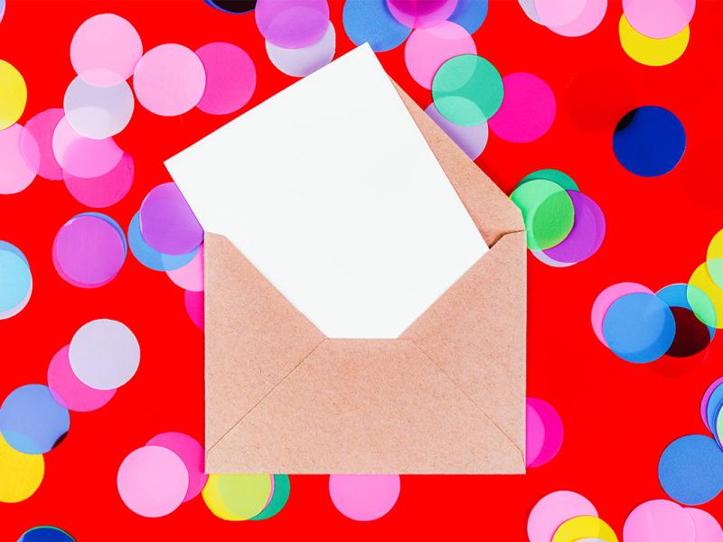 Envelope surrounded by brightly colored circles