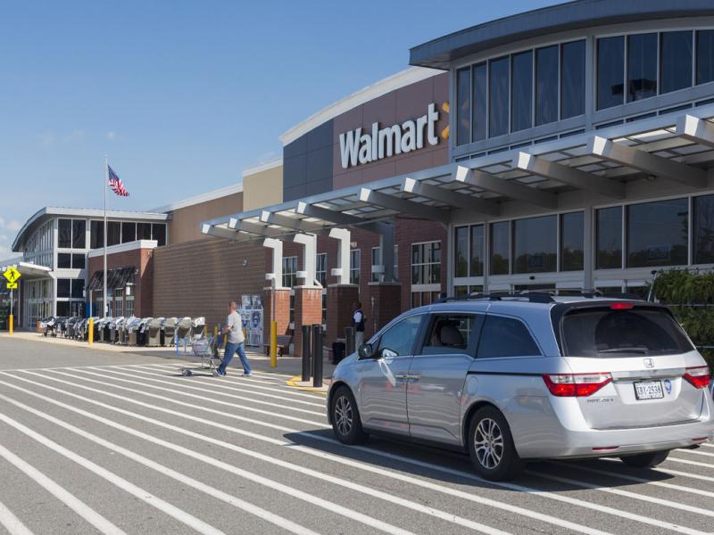 Entrance to large Walmart food supermarket or superstore in Haymarket, Virginia