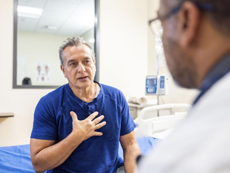 A senior man and doctor having a conversation