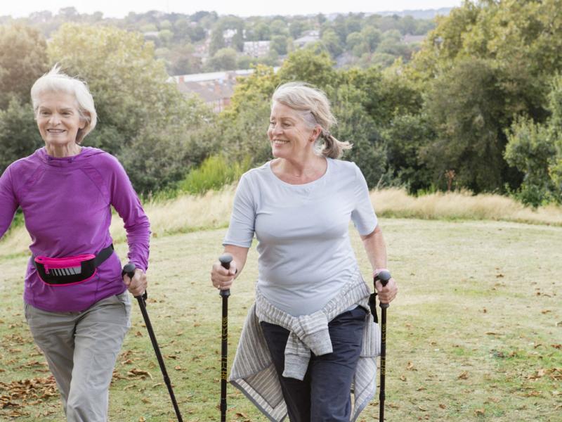 Two happy women on a walk