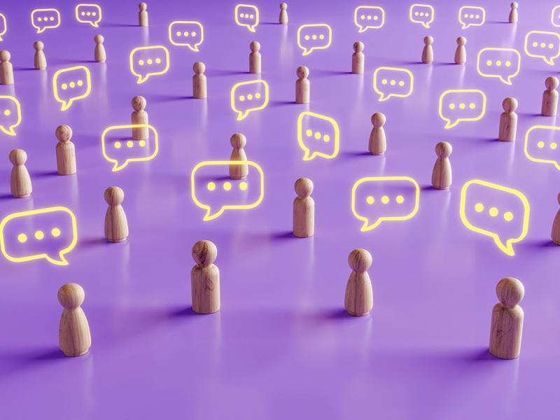 Group of block figures accompanied by text balloons