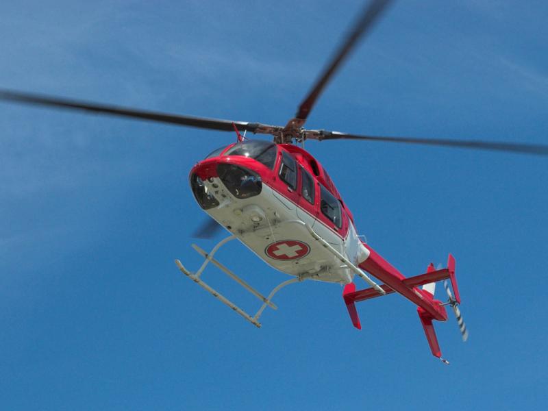 Medical helicopter in sky