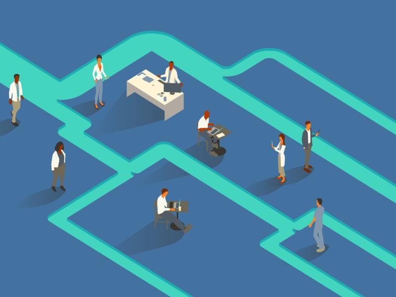 A group of health care workers gather around within a flowing river of light