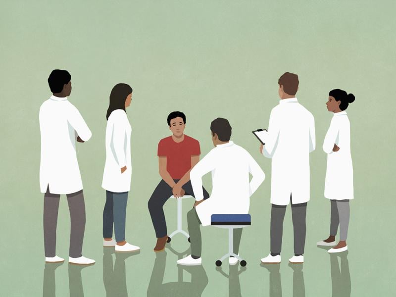 Group of residents and patient