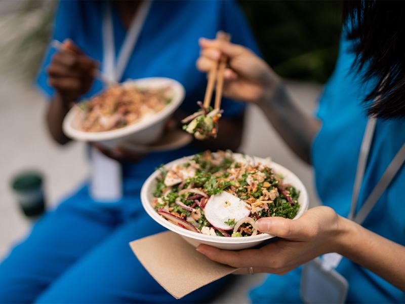 Health care workers eating food