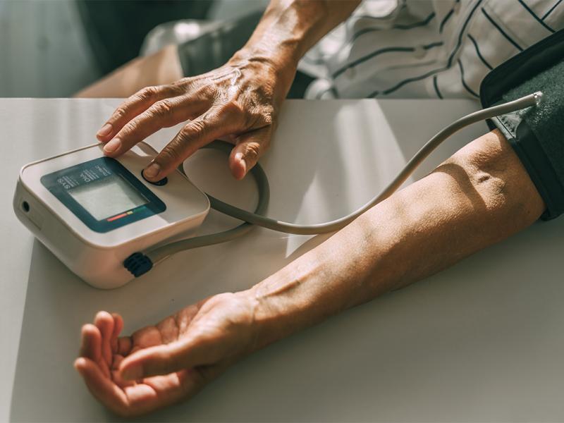Patient uses blood pressure device