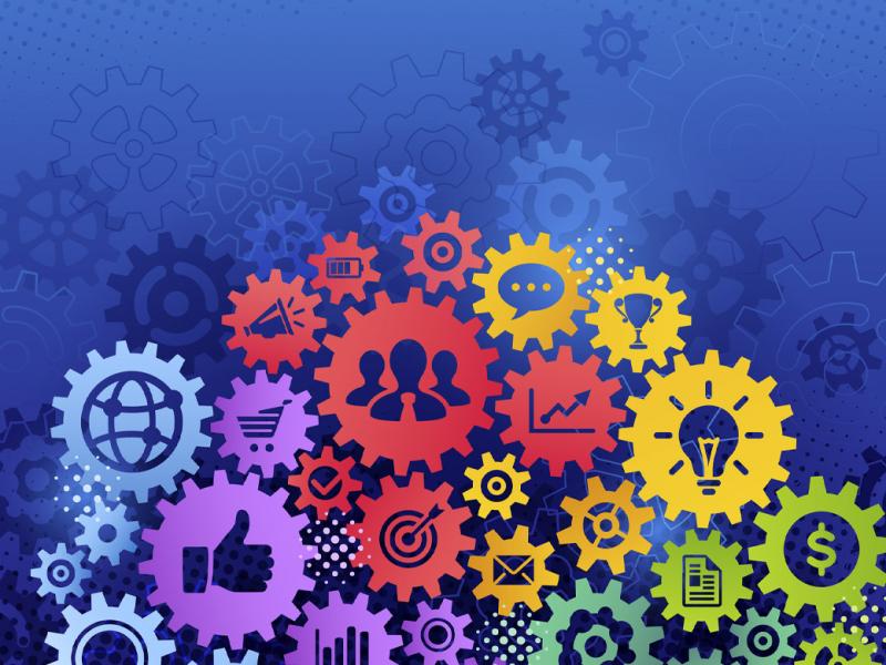 Gears with icons symbolizing business, success, teamwork