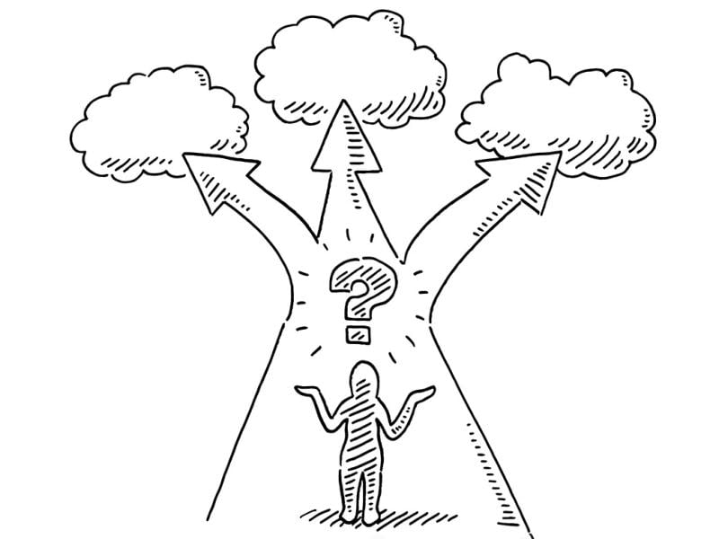 Figure stands in front of diverging paths