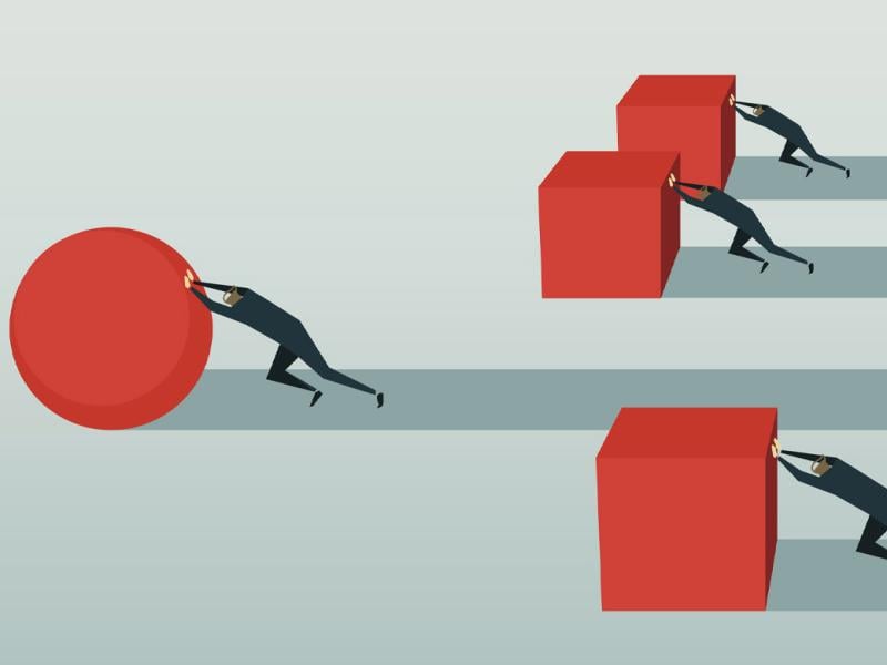 Figures push giant blocks