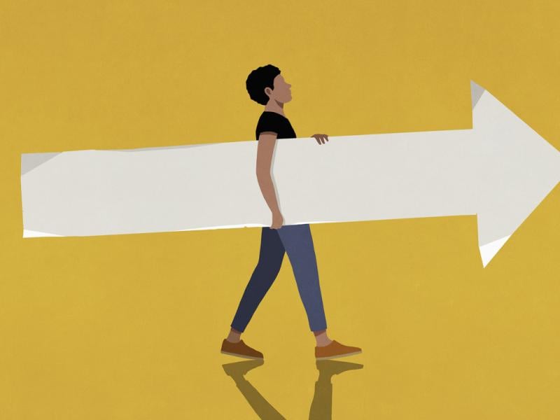 Figure holds a giant arrow