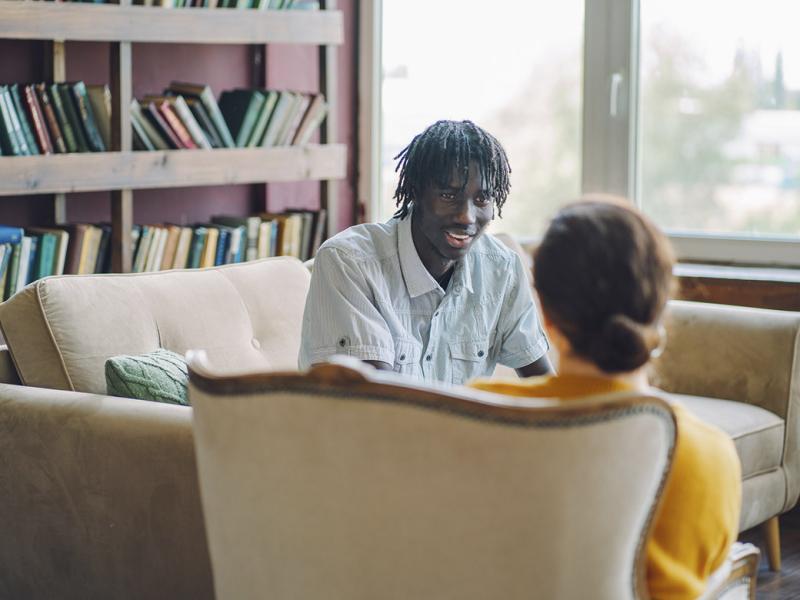 Counselor listens to a patient