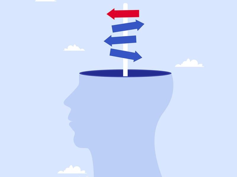 Arrows facing different directions on a human head silhouette